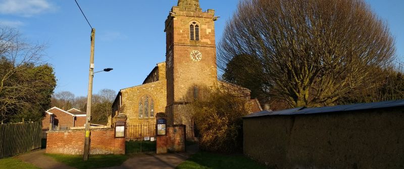 the west entrance to St Faith's church viewed from Church Walk