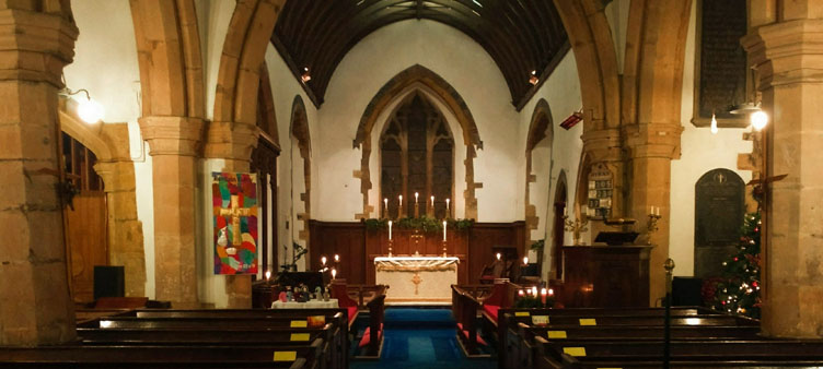 the interior of St Faith's church, Kilsby. showing the nave, chancel and altar