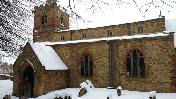 St Faith's church, Kilsby, from the south in the snow, showing the nave and porch