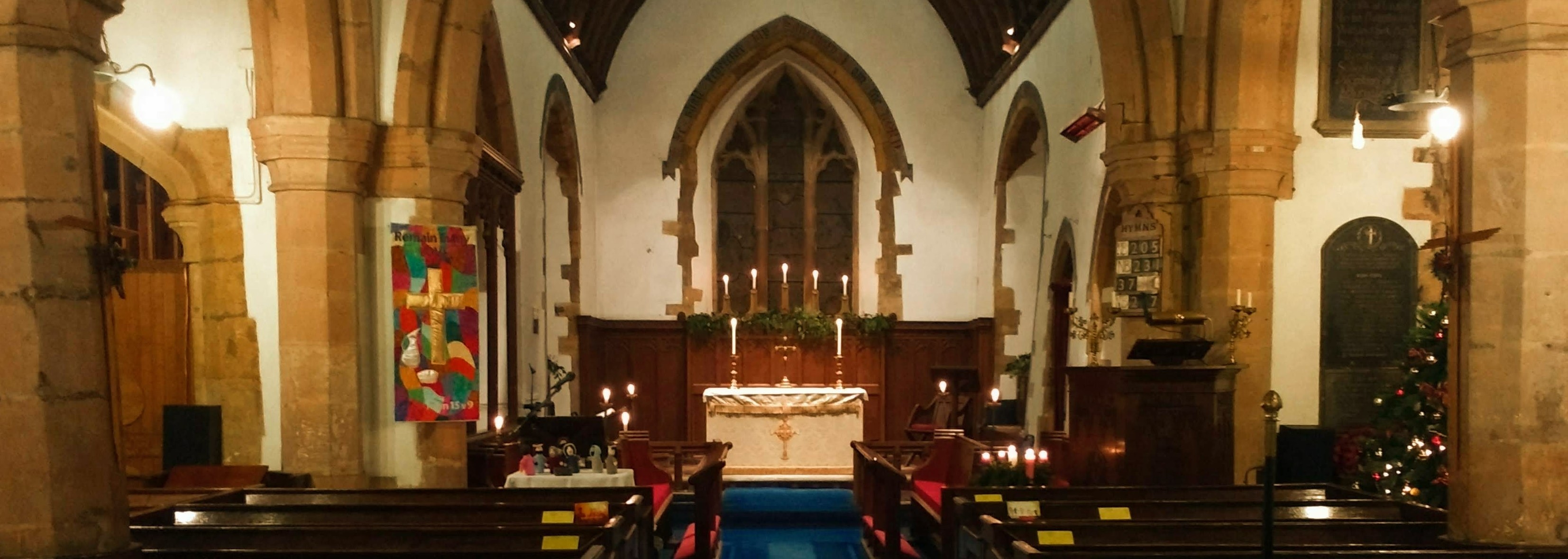 the interior of St Faith's church, Kilsby. showing the nave, chancel and altar